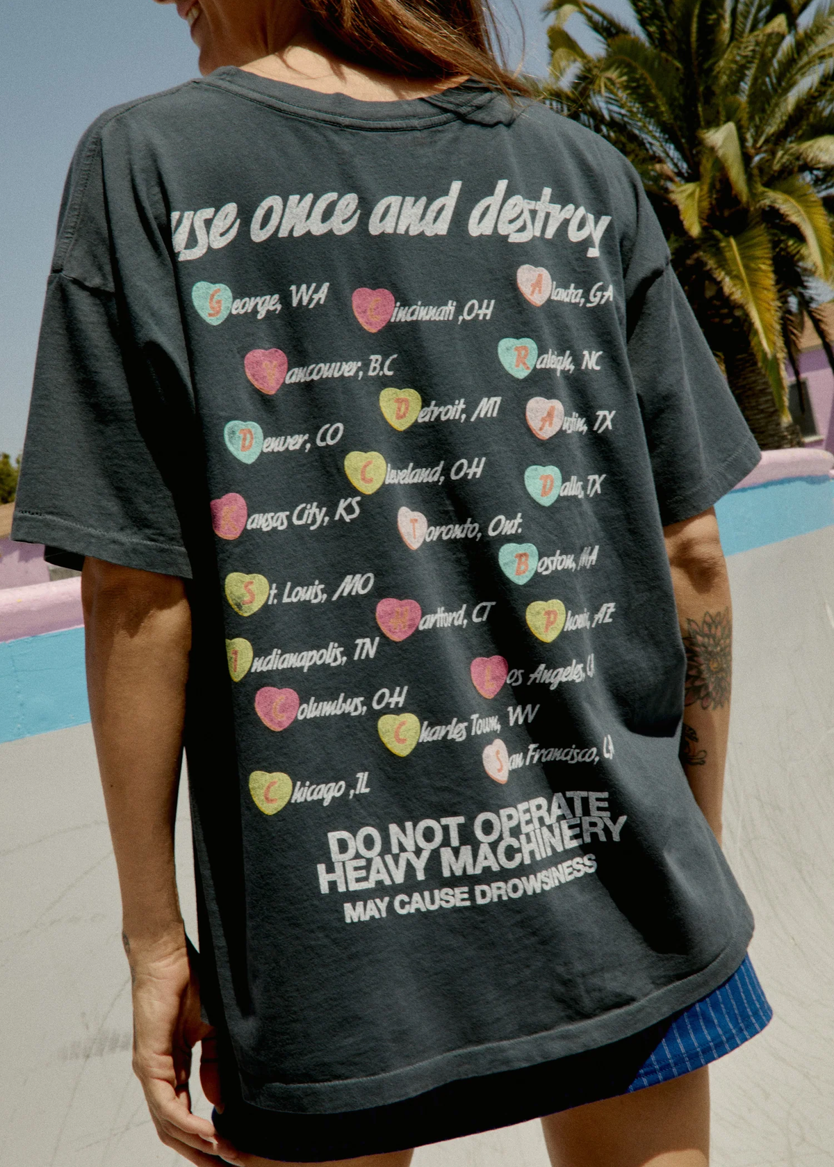 Hole Live Through This Band Tee by Daydreamer LA - back view with candy heart and city tour date graphics